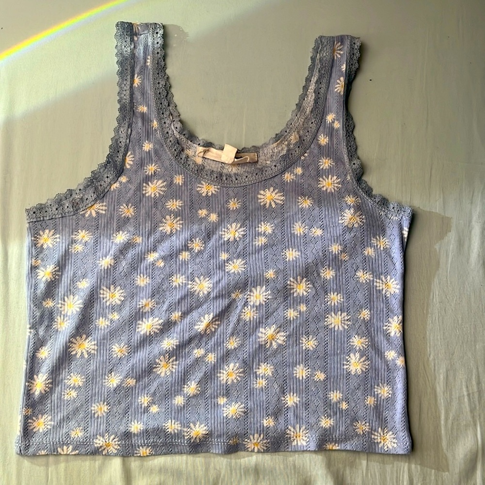 baby blue daisy tank top from hippie rose with soft fabric and lace lining.